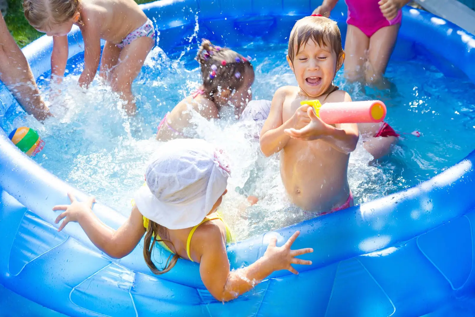 A rental property pool enclosed by a safety fence